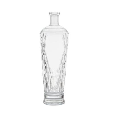 China Beverage Super Flint Embossed Whisky Empty 1000ml Round Spirits Vodka Glass Brandy Bottles for sale