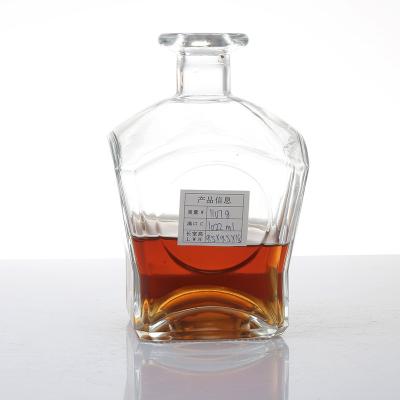 China Daily Life Wholesale 1000ml Unique Shape Empty Liquor Glass Bottle With Glass Cork for sale