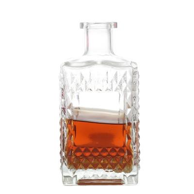 China Super Beverage Flint 500ml Square Shape Spirits Embossed Glass Whiskey 50cl Rum Brandy Liquor Bottle With Cork for sale