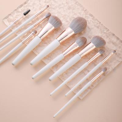 China Angular Blush Wholesale White Rose Gold 11 White Makeup Brush Set for sale