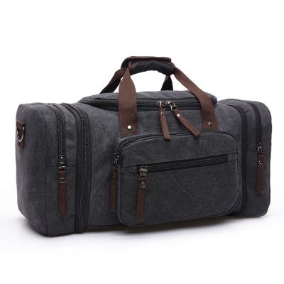 China Men Canvas Shoulder Duffle Weekend Travel Bag Large Capacity For Outdoor Camping for sale