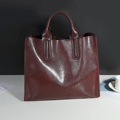 China Cowhide Casual Tote Black Leather Handbags With Mobile Phone / Document Pocket for sale