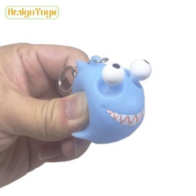 China Promotion OEM/ODM PVC Squeezable Eyes Jumping Action Number Toys Dinosaur Promotion Key Chain Promotional Gift for sale