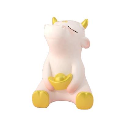 China Cow Coinbank PVC Custom Made OEM Coin Bank Collectible Designer Figurine for sale