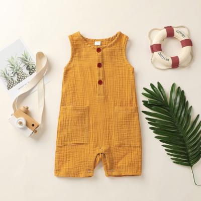 China 2021 Summer Wholesale Casual Cotton Baby Canvas Sleeveless Vest With Wooden Buckle Baby Canvas Overalls for sale