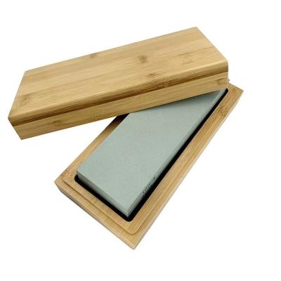 China Cuchillo de doble cara afilador de piedra cocina 611g con óxido de aluminio material abrasivo en venta