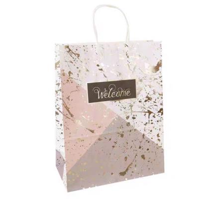 China Recycled Materials Gift Paper Bag White Paper Bag White Paper Most Popular Floral Shopping Gift Clear Bag for sale