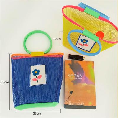 China Hot-selling Portable Amazon Fashion Summer Mesh Hollow Out Contrast Color Wrist Beach Bag for Vocation for sale