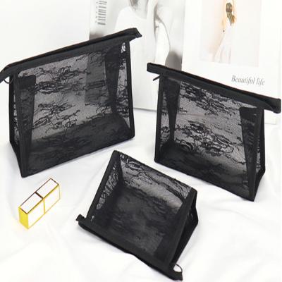 China Fashion Mini Lace Three-Dimensional Triangle Ins portable Mesh Cosmetic Bag For Female transparent for sale