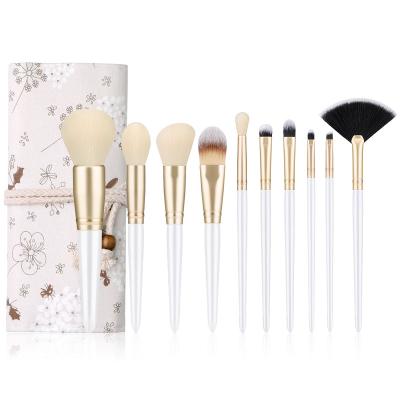 China Angular Blush 10 Pieces Logo Beauty Tools Special Design Hair Brush Custom White Luxury Natural Makeup Brush With Flora Bag for sale