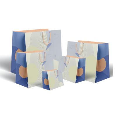 China Recycled Materials Kraft Custom Craft Printed Gift Party Paper Shopping Bags for sale