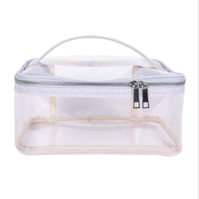 China Promotional Customized PVC Zipper Fashion Makeup Bag Transparent Waterproof Plastic Clear Plastic Travel Cosmetic Bag for sale