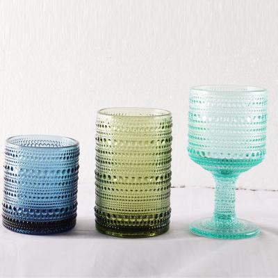 China High Quality Wine Wedding Decoration Custom Embossed Water Wine Glass Goblet Colored Glass Drinking Cup for sale