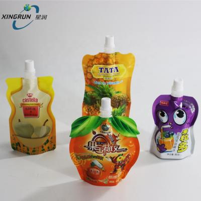 China 2020 Hot Sale Juice Irregular Shape Laminated Drink Tea Packaging Spout Plastic Bags for sale