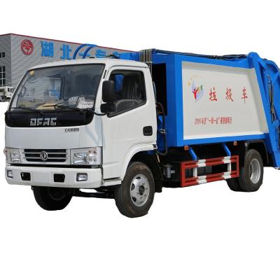 China Dongfeng 4x2 8cm3 10cm3 12cm3 Small Garbage Compactor Truck Duolika Duolika Garbage Truck New or Used for sale