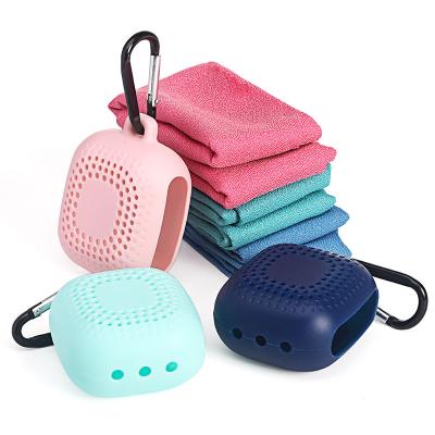 China Compressed Sports Towel Microfiber Sports Towel Sports Cooling Towel With Silicone Box for sale