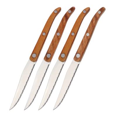 China 4pcs Disposable Wooden Handle Steak Knife Set Wooden Handled Serrated Steak Knives for sale