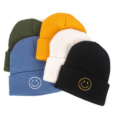 China Hot Selling Acrylic Knitting Winter COMMON Logo Beanies Smile Hat Custom Made Simple Embroidery Hats for sale