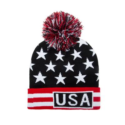 China Fashion COMMON Winter Warm Logo Pompom Beanie United States Flag Print Knitted Hats for sale