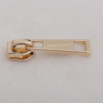 China Custom Engraved Zinc Alloy Kirsite Logo Metal Zipper Pull Bag Zipper Slider Puller For Handbag for sale