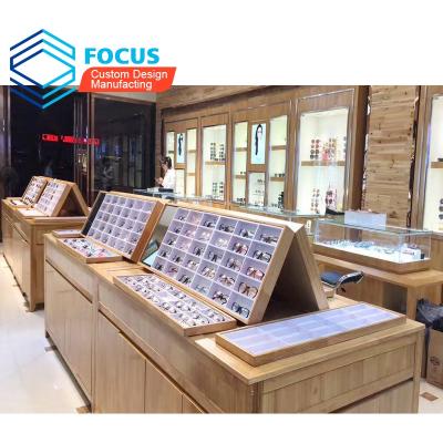 China Wooden Optical Shop Furniture Mall Display Wooden Retail Shop Kiosk Modern Optical Light Style Custom Made New for sale