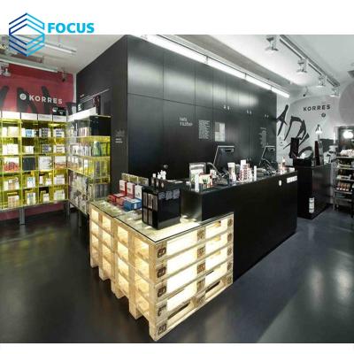 China Retail Store Cosmetic Rack Luxury Cosmetics Shop Cosmetics Floor Fit Wood Display Stand for sale