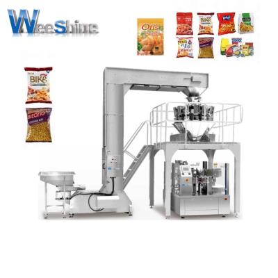 China Floor Type Food Automatic Pellet Food Pouch Premade Vertical Packing Machine For Chips Tomato Crisps Snack Candy With Low Rib Film for sale