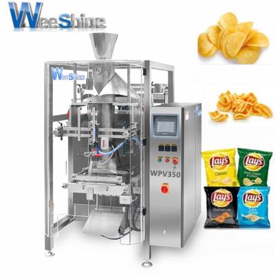 China Automatic Multifunctional Food Chips Snacks Candy Packing Machine for Heavy Food Packing with Multihead Weigher for sale