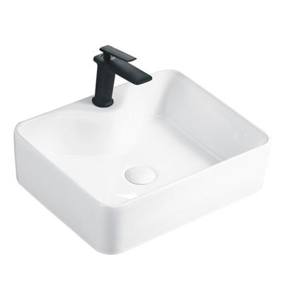 China Easy Clean White Bathroom Basin Rectangular Counter Table Ceramic Wash Basin for sale