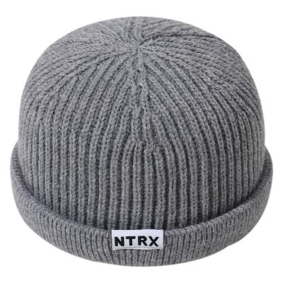 China COMMON Best Sell Fantastic 16 Colors Cotton Knitted Daily Winter and Autumn Warm Unisex Solid Color Wear Beanie Hat for sale