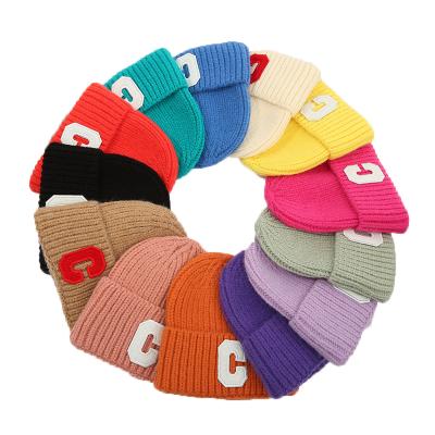 China Casual High Quality Various Colors Embroidered Knitted Warm Hats Winter Beanies Kids Hats Caps for sale