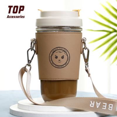 China Minimalist Plant Cute Leather Mug Drink Sleeves Holder Coffee Mug Sleeves With Strap for sale