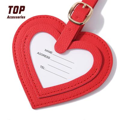 China Custom Bag Tag Logo Heart Name Plates Custom Made High Quality For Handbags Leather Tagged Bag Luggage for sale