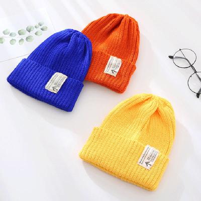 China COMMON Customize Acrylic Logo Winter Beanie Hat for sale