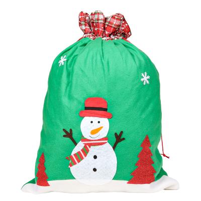 China EG Fabric Parties Large Holiday Drawstring Santa Snowman Fabric Bags Christmas Gift Bag Plastic Nonwoven Felt Wholesale for sale