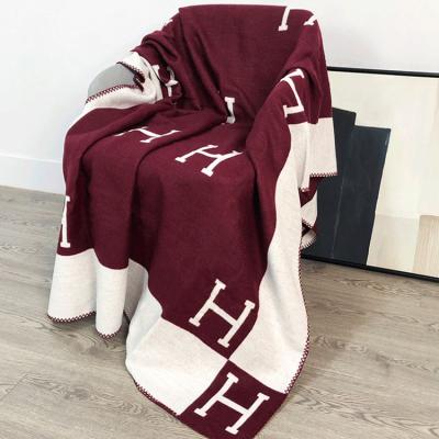 China Wearable Luxury H Letter Cashmere Wool Thick Touch Throw Super Soft Knitted Blanket For Winter For Sofa Home Decor for sale