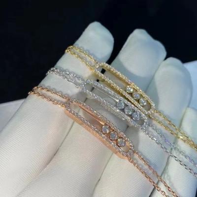 China Jewelry Customized AU750 Gold Move Bracelet 18K Yellow Gold With Diamonds 3 Dimonds Moveable Chain for sale