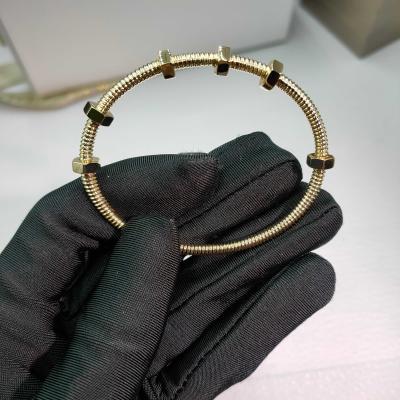 China Oro amarillo de 18K (750/1000). ancho: brazalete Ecrou de Cartier de 3,5 mm en venta