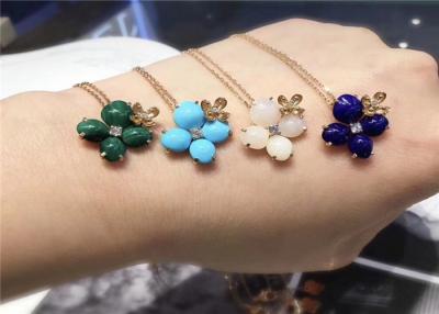 中国 若い女性のためのカスタマイズされた 18Kの金のダイヤモンドの吊り下げ式の花の形 販売のため