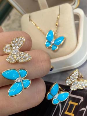 China VCA Twee vlinder oorbellen 18k geel goud met turquoise diamanten Te koop