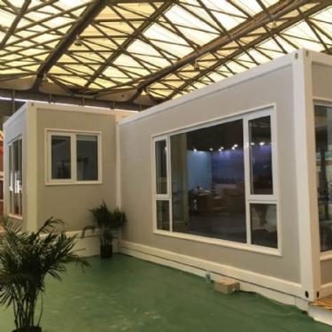 China Modern Prefab Good Insulation Flat Pack Container Glass House In South Africa for sale