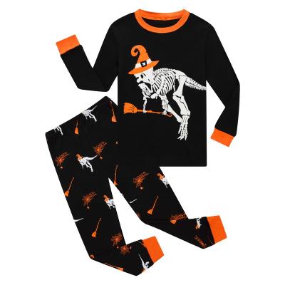 China Big Dinosaur Thermal Pajamas Boys Girls Glow In The Dark Skeleton Long Sleeve Halloween Kids Pajamas for sale