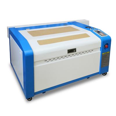 China Laser Engraving Redsail M4060E Best Price CO2 Laser Wood Engraving Machine / Portable Laser Engraving Machine for sale