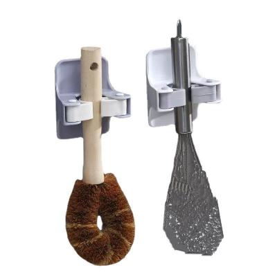 China Living room bathroom kitchen ABS plastic broom clip, strong broom holder clip, multifunctional broom holder in bathroom and kitchen for sale