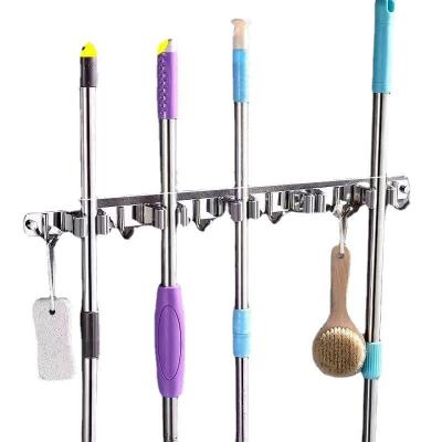 China Behind Doors/On Walls Multifunctional Broom Hook Wholesale Kitchen Bathroom Broom Holder Stainless Steel Wall Mounted Broom Clip for sale