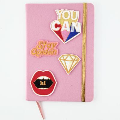 China Top quality pilou softcover notebook with remove patch customized logo for sale