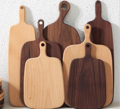 China Wooden cutting board made of cheese wood for sale