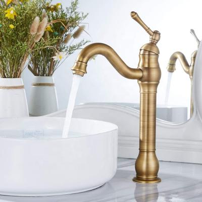 China Metered Faucets 360 Degree Swivel Spout Tall Vessel Sink Bathroom Basin Faucet Antique Brass for sale