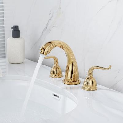 China Metered Widespread Faucets Double Handle Deck Mounted Gold Bathroom Sink Faucet 3-Hole Basin Mixer for sale