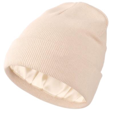 China Wholesale Custom Logo Women Unisex Solid Skull Fashion COMMON Hat Knitted Winter Beanie Hats With Silk Lining Watch for sale